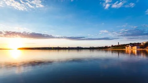 Sunset over the town pond Stock Photos