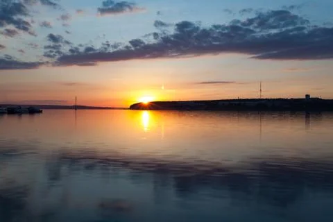 Sunset over the town pond Stock Photos