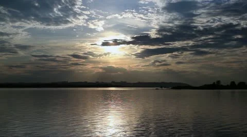 Sunset over the town from shore Stock Footage 12036427