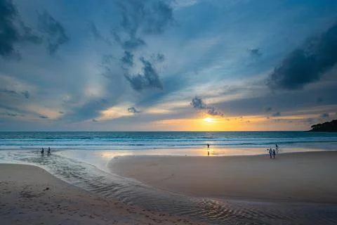 Sunset Over Tranquil Beach Stock Photos