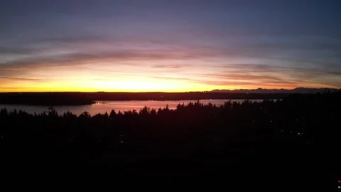 Sunset Over Tranquil Landscape with Water Reflection Видео 348337375