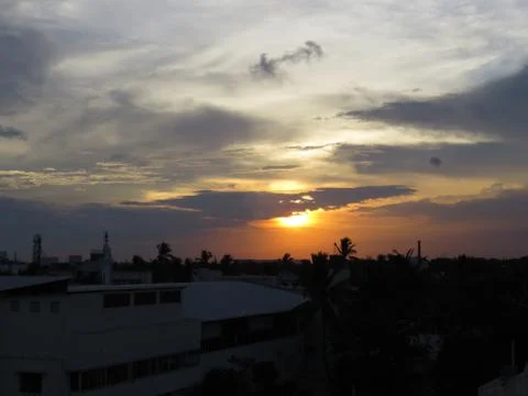 Sunset over the trees Stock Photos