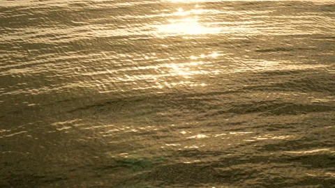 Sunset over the tropical beach. ocean beach waves on beach at sunset time Stock Footage 134314294