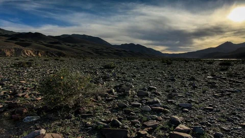 Sunset over the valley of the river Khovd, Mongolian Altai, Mongolia. Full HD Stock Footage 72870328
