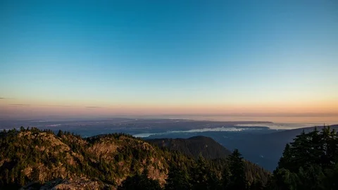 Sunset Over Vancouver and the Top of Mount Seymour Stock Footage 73307473