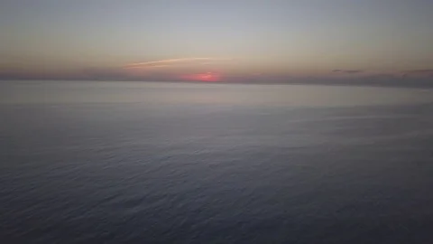 Sunset over vast ocean Stock Footage 82763482