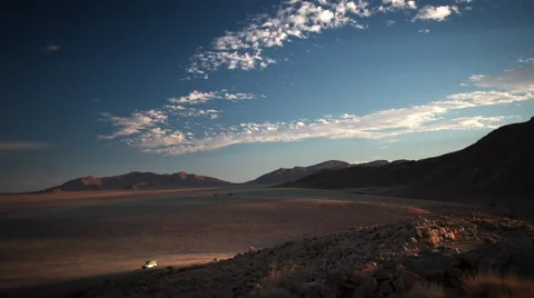 SUNSET OVER VAST PLAIN WITH ATV UHD 4K Stock Footage 45345224