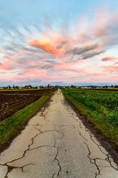  Sunset over village with dramatic sky Sunset over fields and Austrian vil... Stock Photos