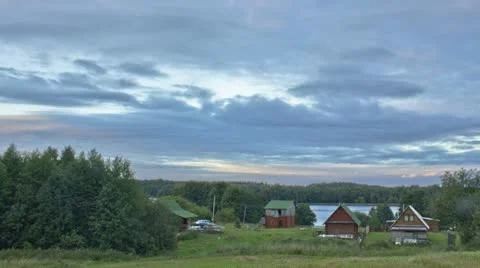 Sunset over the village Stock Footage 12060259