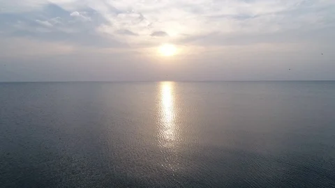 Sunset over water, Beach Moving Camera Follow Aerial, 4K Stock Footage 96784952