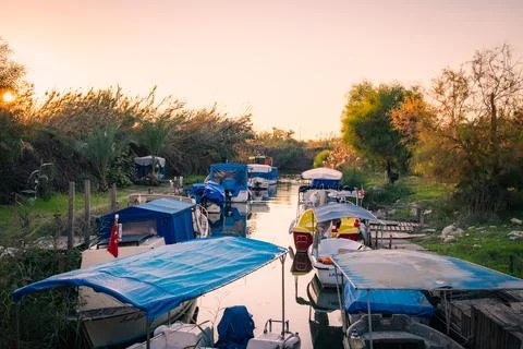 Sunset Over a Water Canal and Boats Foto stock