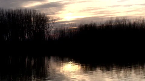 Sunset over water Видео 35764248