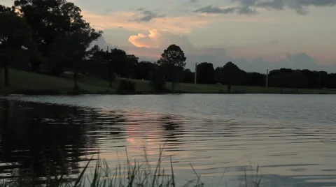 Sunset over water Vídeos de archivo 42232318