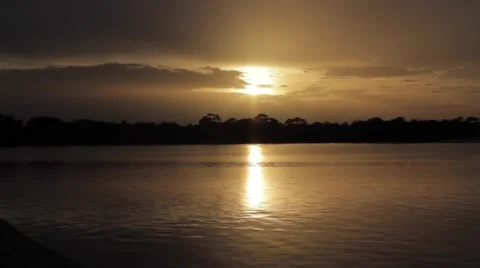 Sunset over water Video stock 42235856