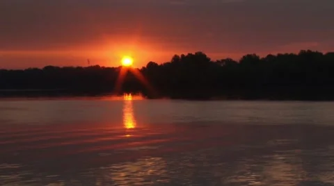 Sunset over water Stock Footage 46814998