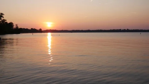 Sunset Over the Water Stock Footage 107440732