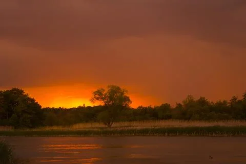 Sunset Over The Water 스톡 사진
