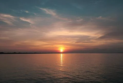 Sunset Over The Water Stock Photos
