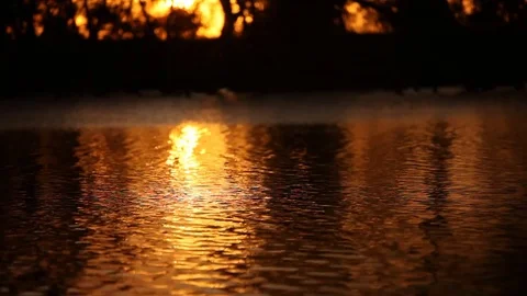Sunset over water - reflections Video stock 72107821