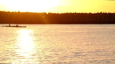 Sunset over the waterbreak Stock Footage 82916910