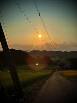 Sunset Over Wheat Fields in Rural Sobetsu, Hokkaido Stock Photos