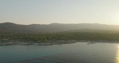 Sunset Over Wild Beach Mountains In the Aegean Sea - Greece 库存影片 250106719