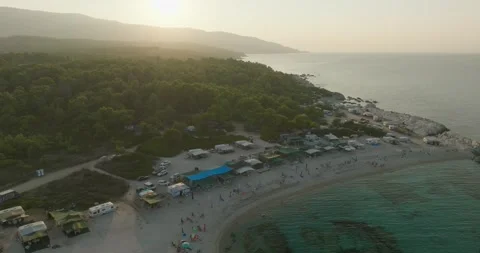 Sunset Over Wild Camping In Mountains By The Sea Coast - Greece Aerial View 库存影片 250107419