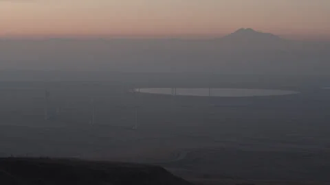 Sunset Over Wind Farm with Distant Caucasus Mountains, Russia Stock-Footage 344037753