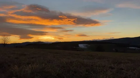 Sunset over the winter hills Stock Footage 232041043