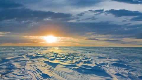 Sunset over a winter plain time lapse scene Stock Footage 264641661