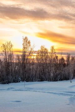Sunset over the winter road 스톡 사진