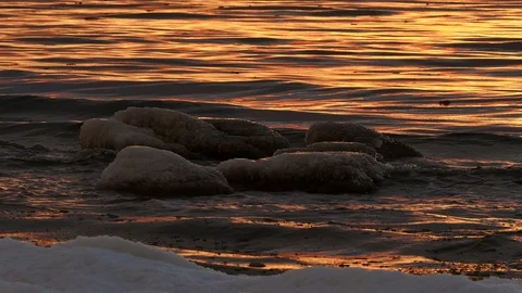 Sunset over winter sea Stock Footage 99936456