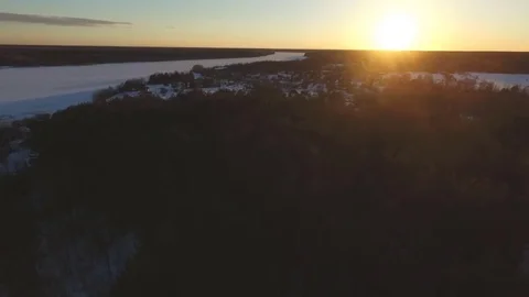 Sunset over a winter village Stock-Footage 79988270