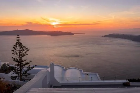 Sunset overlooking the caldera and the sea in Santorini. Stock Photos