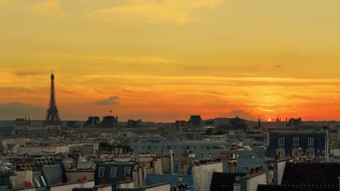 Sunset overlooking French rooftops and the Eiffel Tower Stock Footage 249306400