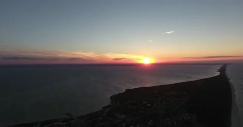 Sunset overt a peninsula, aerial video, open sea Stock Footage 68010004