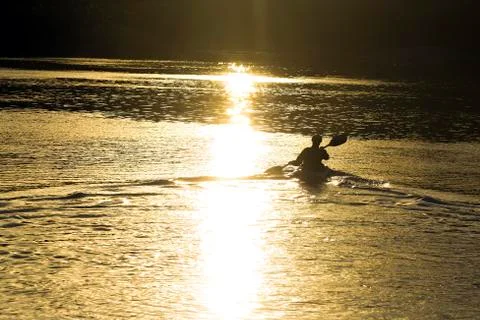 Sunset Paddler Stock Photos
