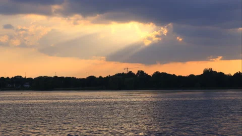 Sunset Paddling Under Crepuscular Rays Time Lapse Stock Footage 134742016
