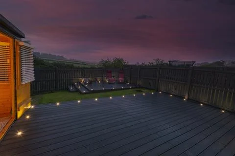 Sunset paints sky in deep purples and oranges Stock Photos