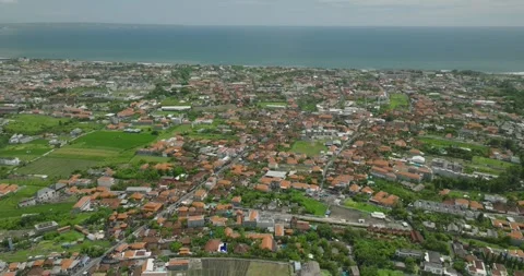 The sunset paints the sky over the tranquil ocean with a warm afterglow Stock Footage 280966519