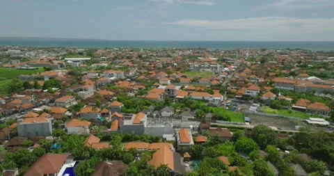 The sunset paints the sky over the tranquil ocean with a warm afterglow Stock Footage 281087898