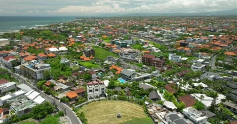 The sunset paints the sky over the tranquil ocean with a warm afterglow Stock Footage 281088210