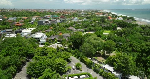 The sunset paints the sky over the tranquil ocean with a warm afterglow Stock Footage 281261729