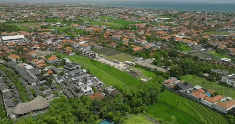 The sunset paints the sky over the tranquil ocean with a warm afterglow Stock Footage 281413865