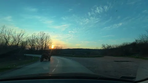Sunset paints sky in soft orange and blue hues Видео 331063593