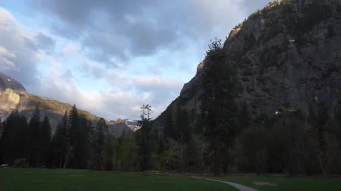 Sunset panorama: Half Dome to Cathedral Rocks during golden hour sunset Stock Footage 241194135