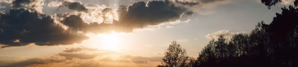 Sunset panorama with magic clouds 스톡 사진