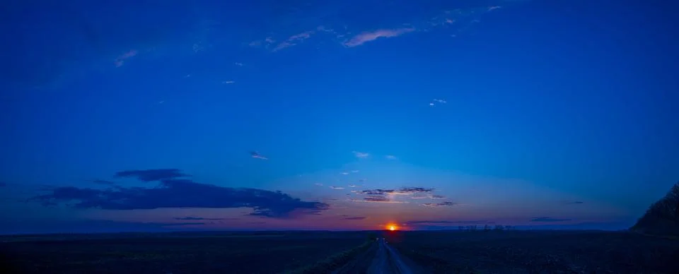 Sunset panorama with red clouds Stock Photos