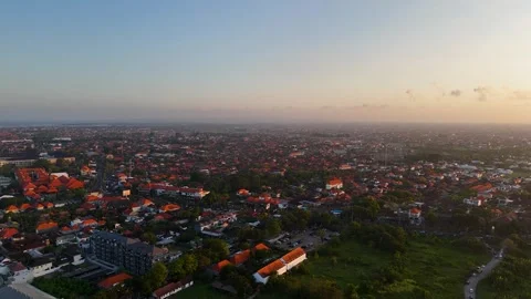 Sunset panoramic aerial view over Sanur district in Denpasar City Stock Footage 344597620