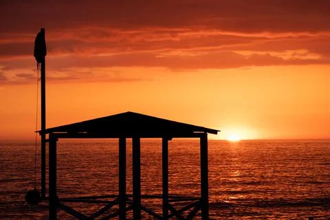 Sunset panoramic view with observation deck silhouette. 스톡 사진